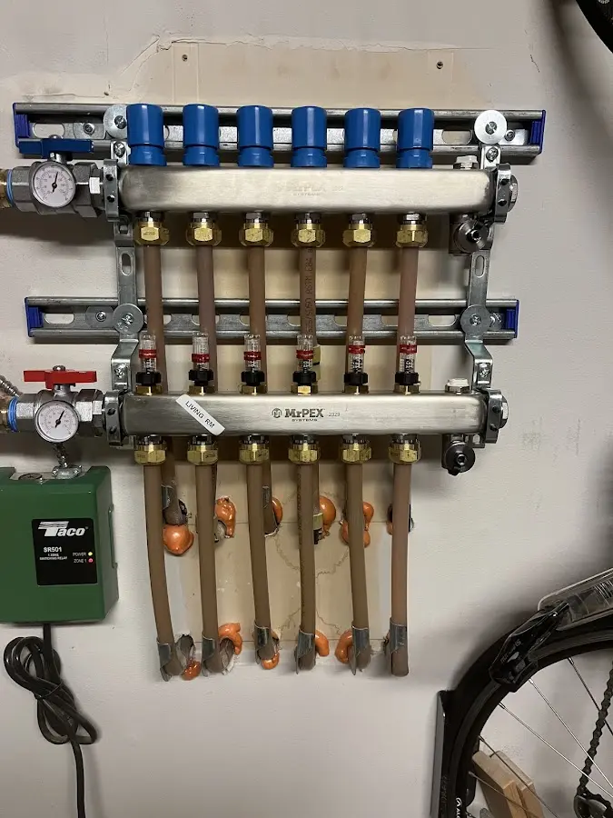 Plumber performing Gas Leak Detection at a residential property in Ridgefield